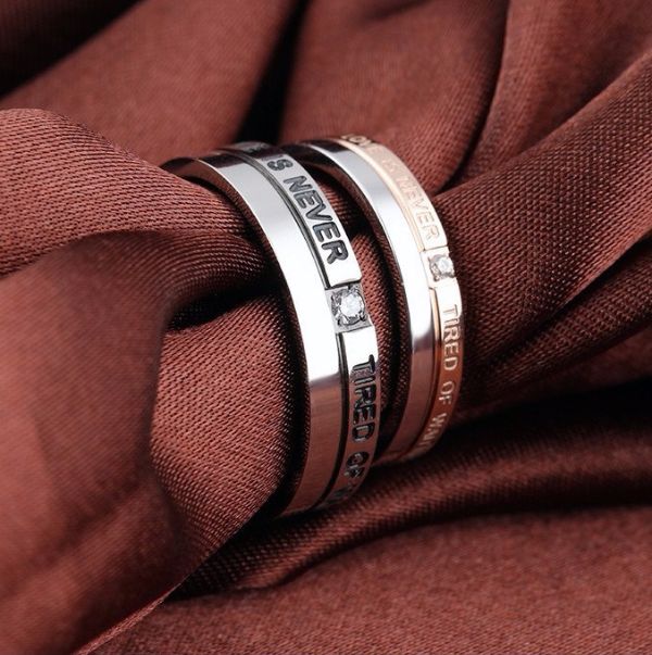 'Love is never tired of waiting' Stainless Steel Couple Rings